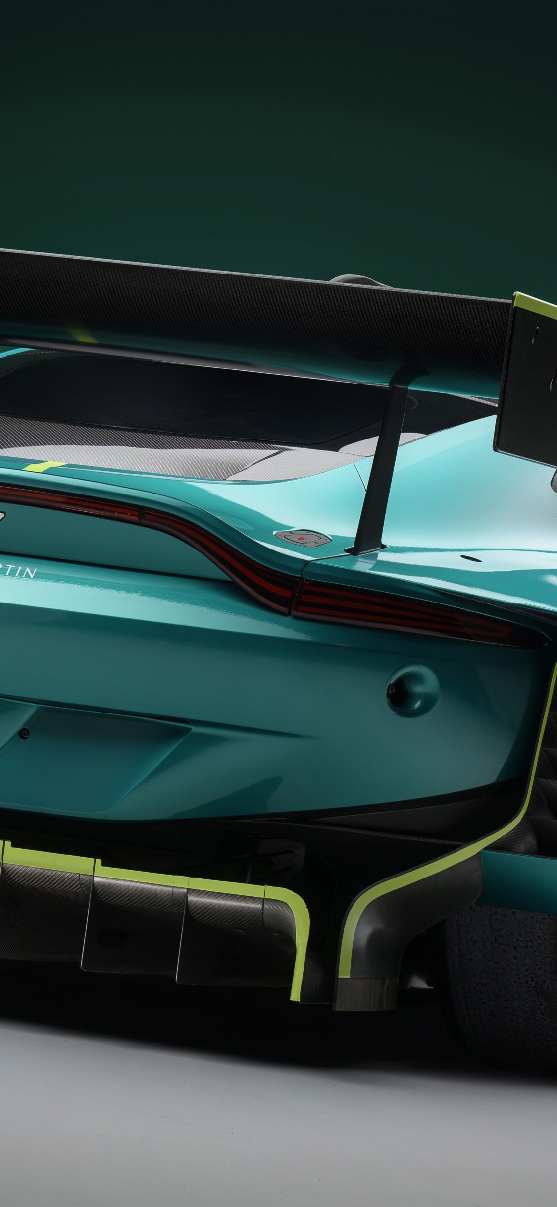 Download Aston Martin Vantage GT3 Rear Wallpaper in 1125x2436 Resolution